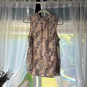 Torrid leopard print blouse.